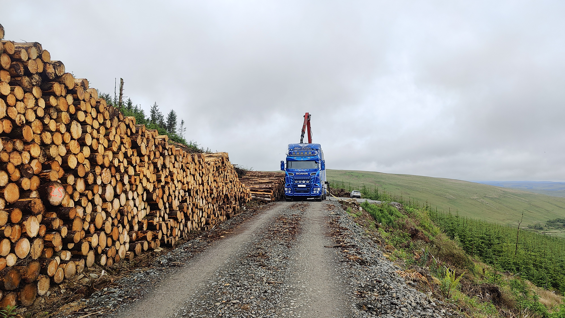 One of 650 UK timber lorries loading sustainably grown roundwood from Dumfries and Galloway’s forests for low impact delivery to our state of the art processing sector.  