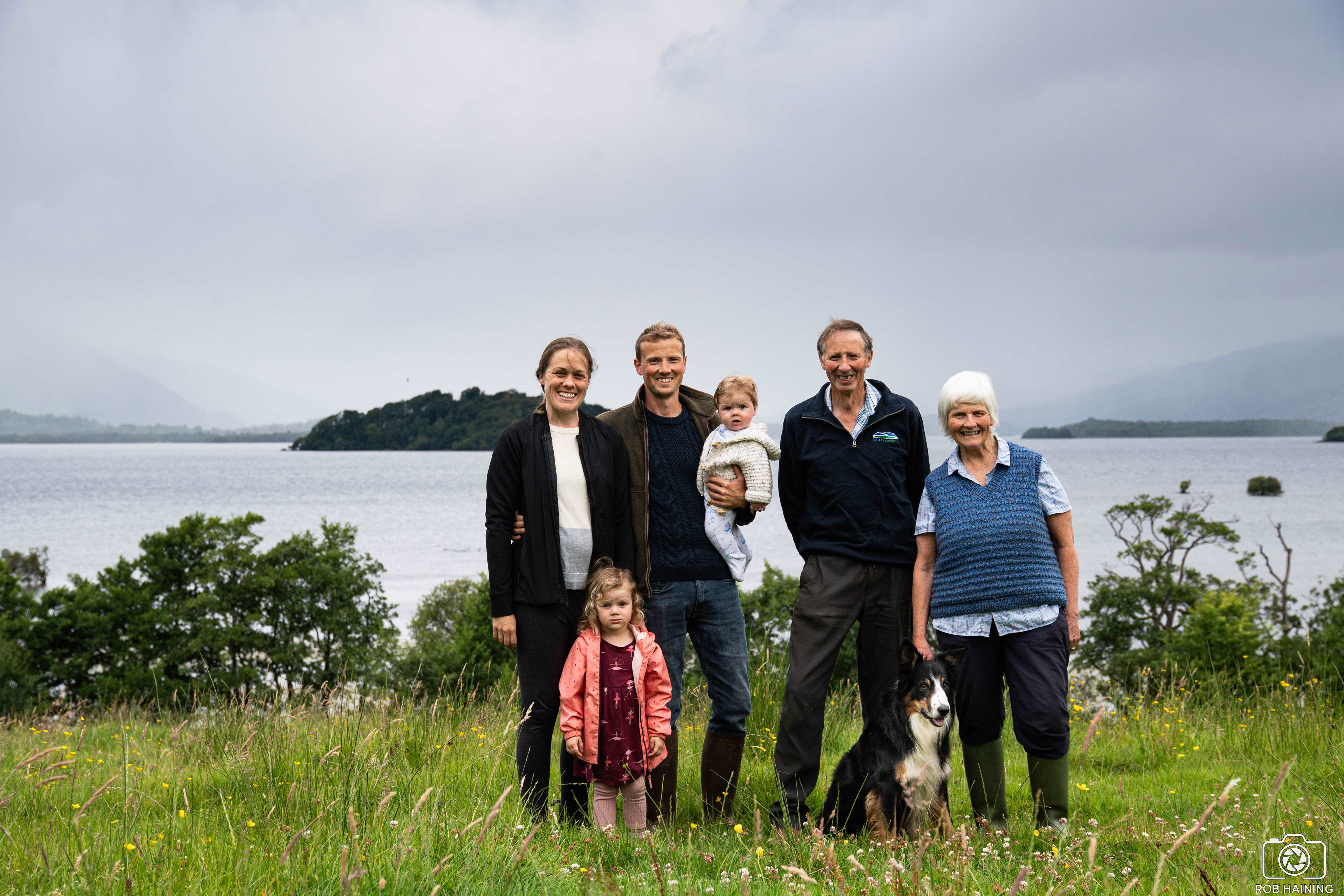The Scott-Park family standing by the loch at Portnellan Farm 